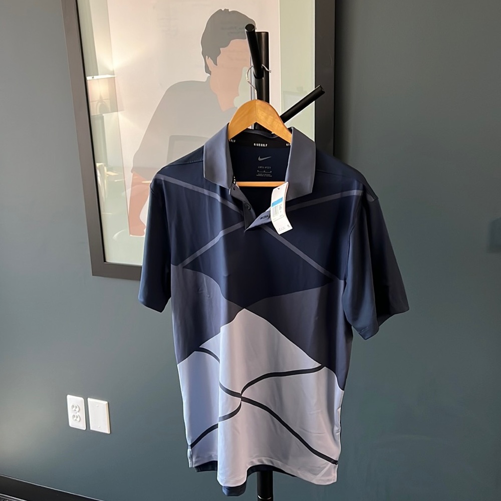 New with tags Nike dri-fit golf shirt.
